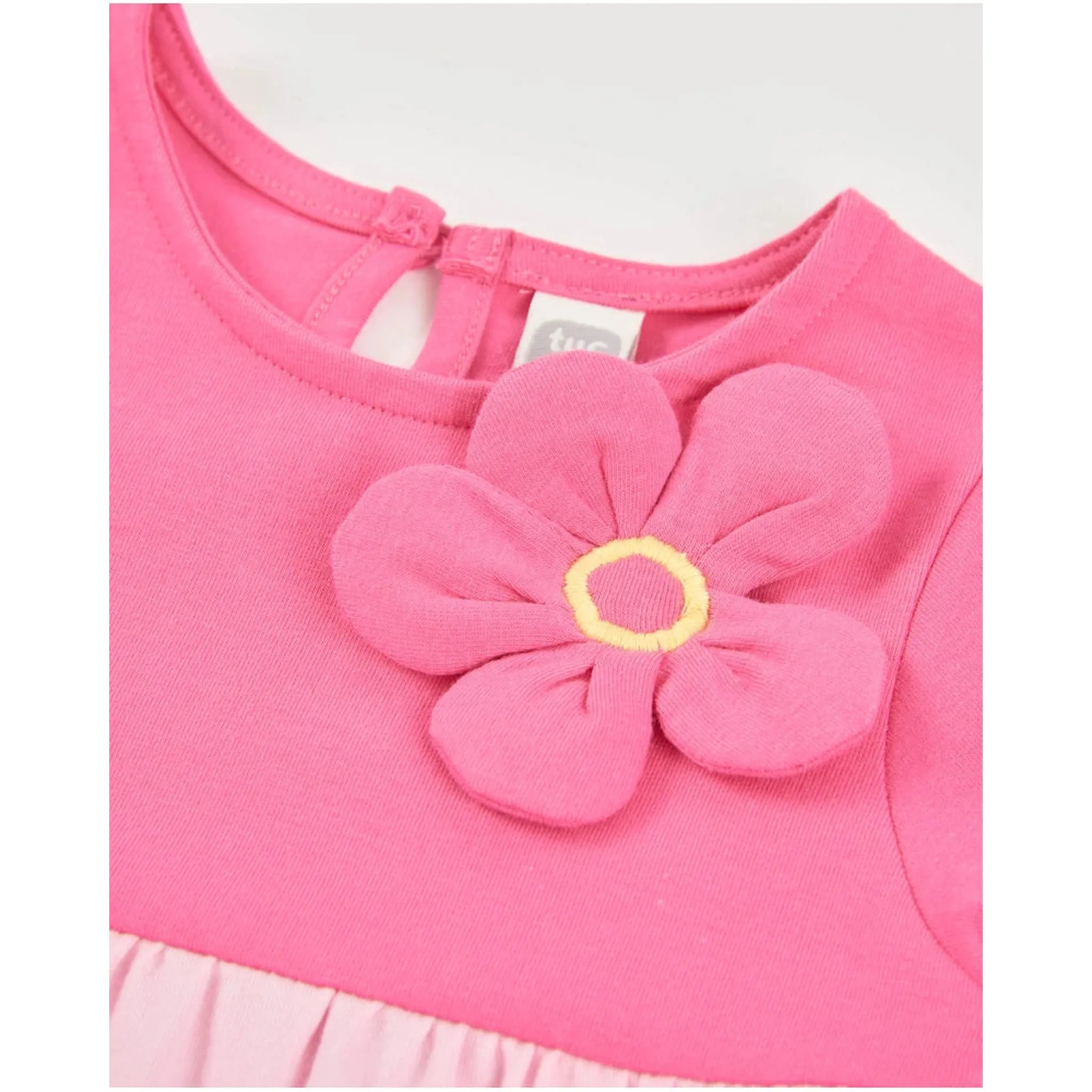 Girlsā knitted dress with applied flower
