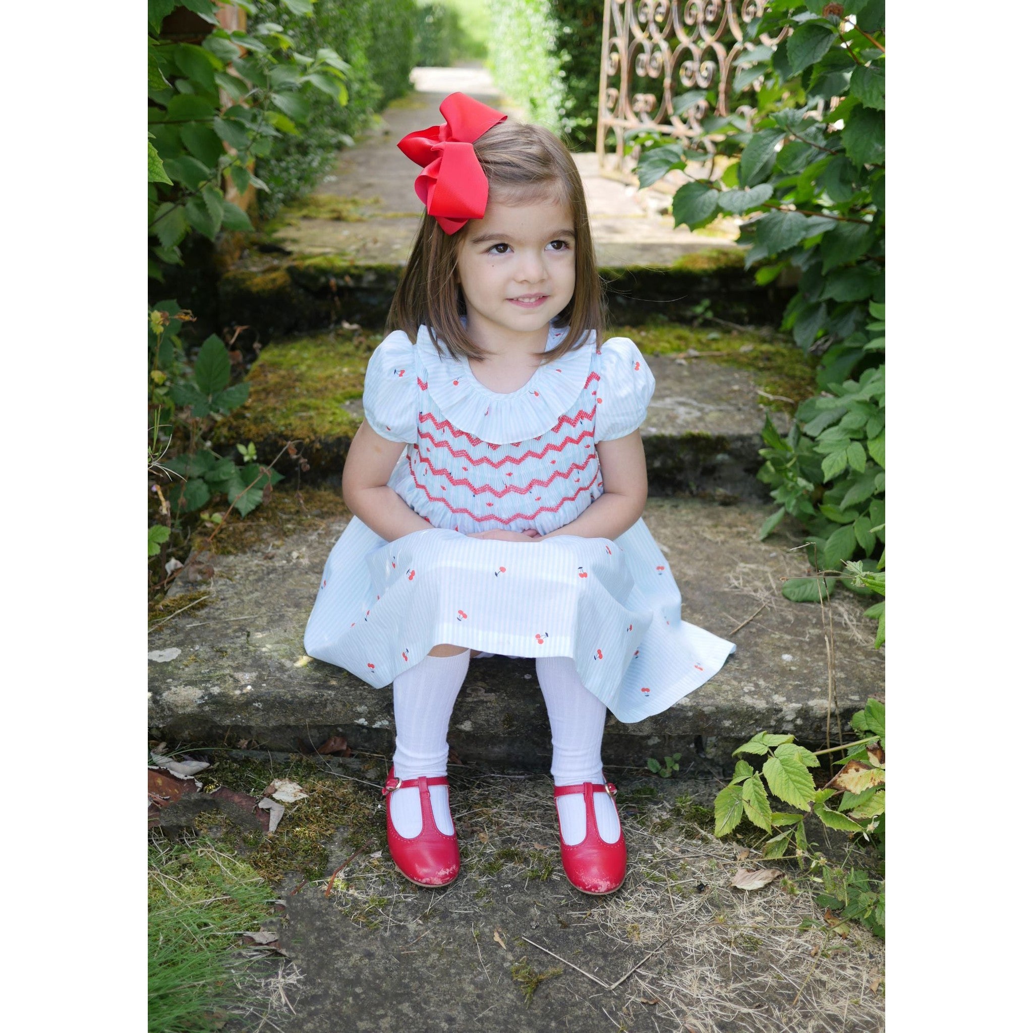 KATHERINE JOHNSON DRESS CHERRY STRIPES WITH MARASCHINO HAND SMOCKING