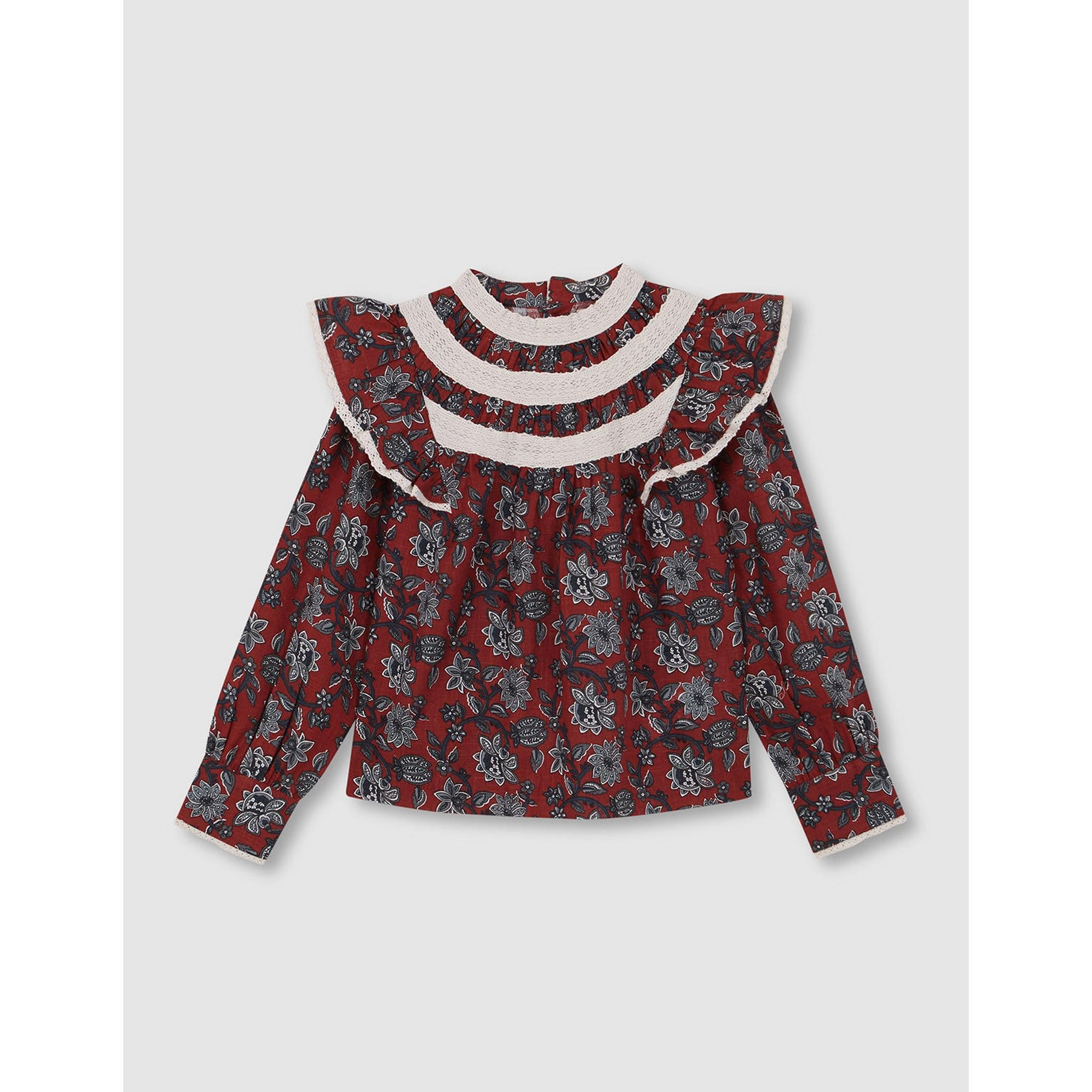 Blusa floral con volantes y falda acolchonada
